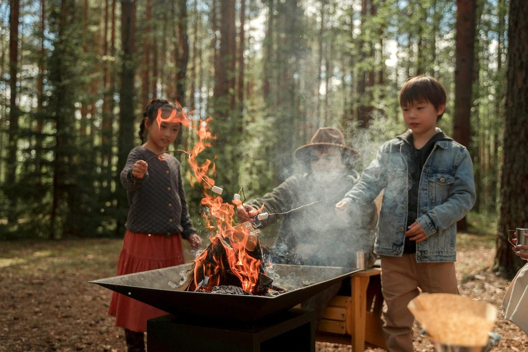 kids toasting smores during camping